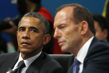 U.S. President Barack Obama (L) listens as Australian Prime Minister Tony Abbott
