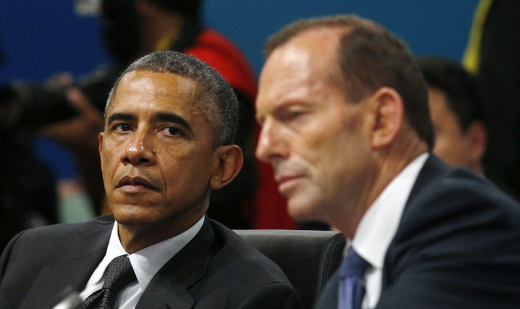 U.S. President Barack Obama (L) listens as Australian Prime Minister Tony Abbott