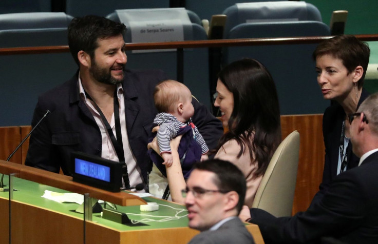 New Zealand Prime Minister Jacinda Ardern kisses her baby Neve