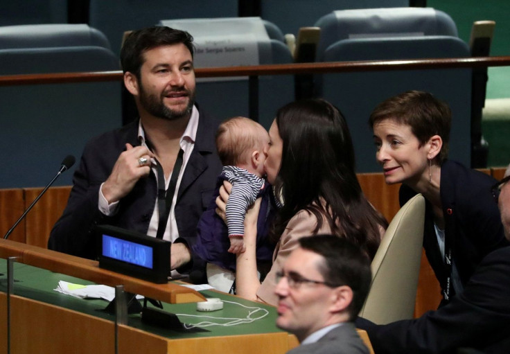 New Zealand Prime Minister Jacinda Ardern kisses her baby Neve