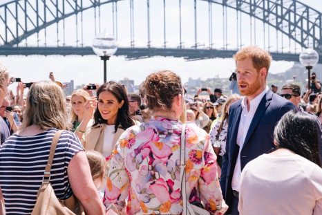Prince Harry and Meghan Markle greet well-wishers in Sydney Australia, Oct. 16, 2018.