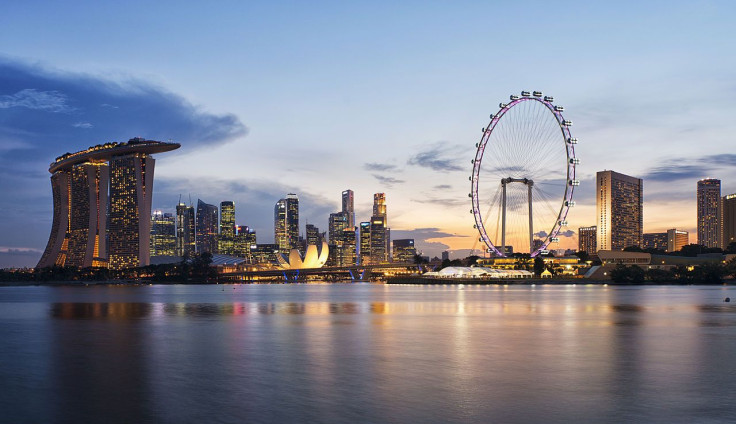 A view of the Singapore skyline at sunset viewed from Gardens by the Bay East.