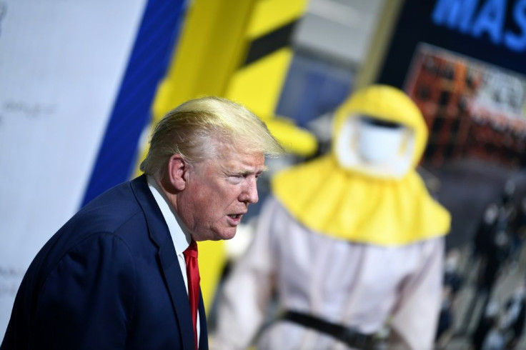 US President Donald Trump -- seen here touring a Ford plant in Michigan -- says it's time for the country to reopen, especially churches