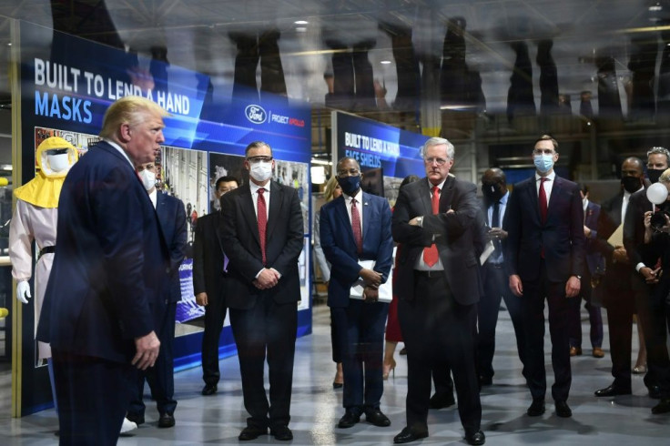 US President Donald Trump speaks during a tour of the Ford Rawsonville Plant, that has been converted to making personal protection and medical equipment, in Ypsilanti, Michigan