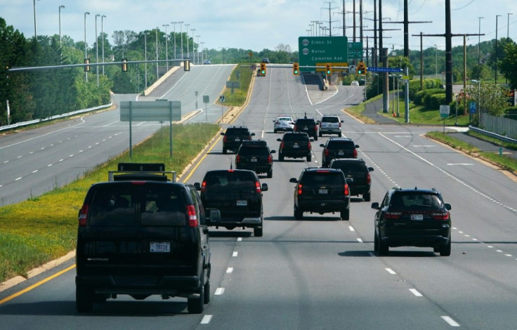 The motorcade carrying US President Donald Trump travels through Reston, Virginia on May 23, 2020.