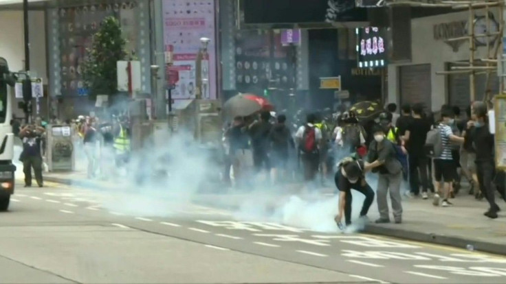 IMAGES Police fire tear gas to disperse a crowd of pro-democracy protesters. Hong Kong has been hit by a fresh round of demonstrations after China proposed new security law feared to halt the freedoms enjoyed by the city.