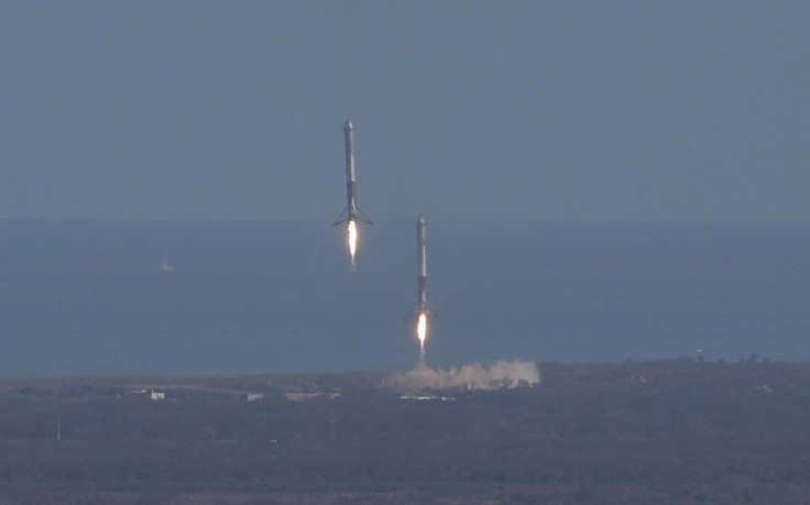 Two of the boosters land at Cape Canaveral Air Force Station after the launch of SpaceX Falcon Heavy rocket on February 6, 2018 in Cape Canaveral, Florida