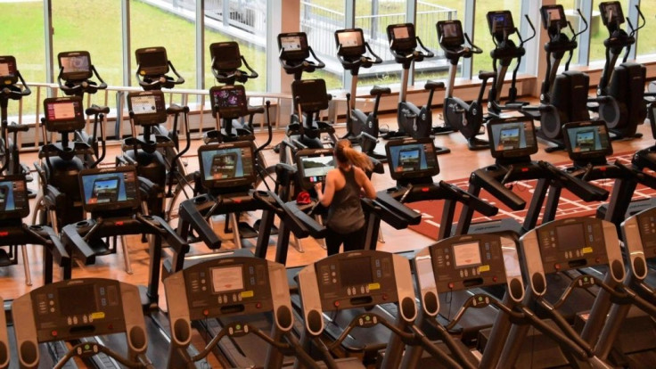 Members return to World Class Laugar, one of Iceland's biggest gyms, after the goverment lifted more coronavirus restrictions on Monday