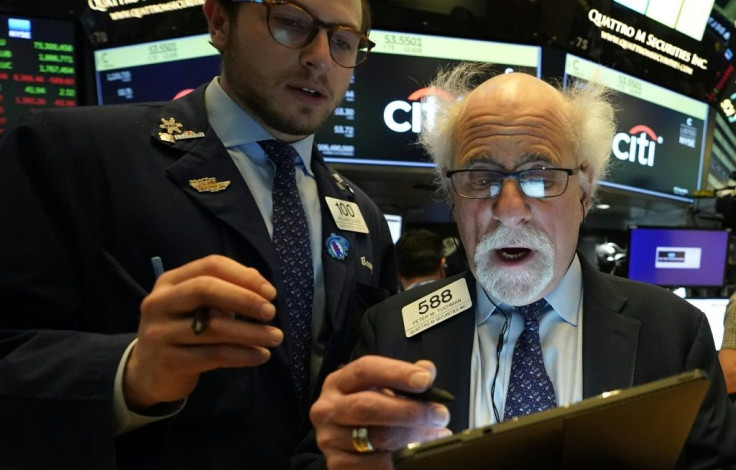 Peter Tuchman(R), floor trader, shown earlier this spring at the NYSE