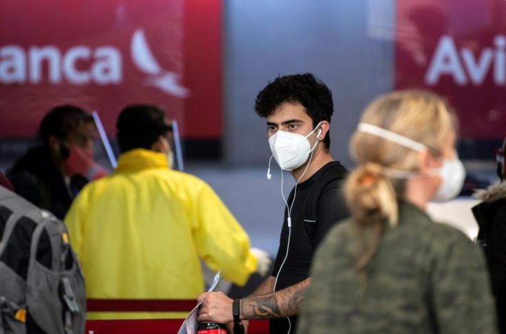 Passengers at the Avianca check-in area in Mexico City's  Benito Juarez airport on May 20, 2020
