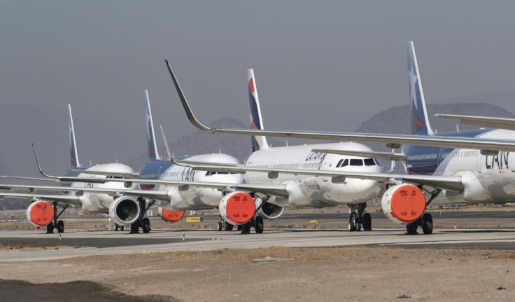 LATAM airlines aircraft sit on the tarmac at Santiago airport