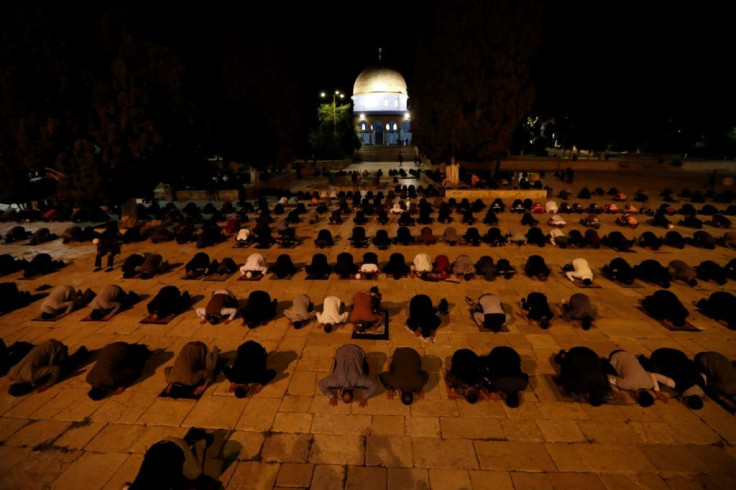 Dozens of worshippers in protective masks were let into the compound in the early hours, ahead of the first prayers of the day