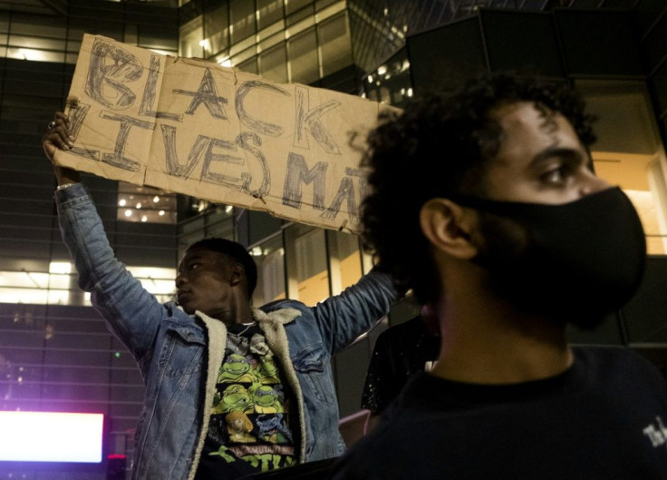 Protesters in Detroit rally over the death of 46-year-old George Floyd at the hands of police in Minneapolis, Minnesota