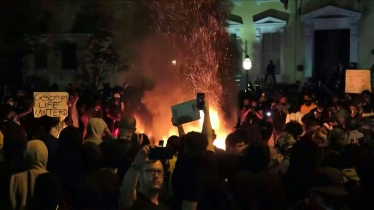 Crowds of protesters break curfew in Washington to demonstrate near the White House