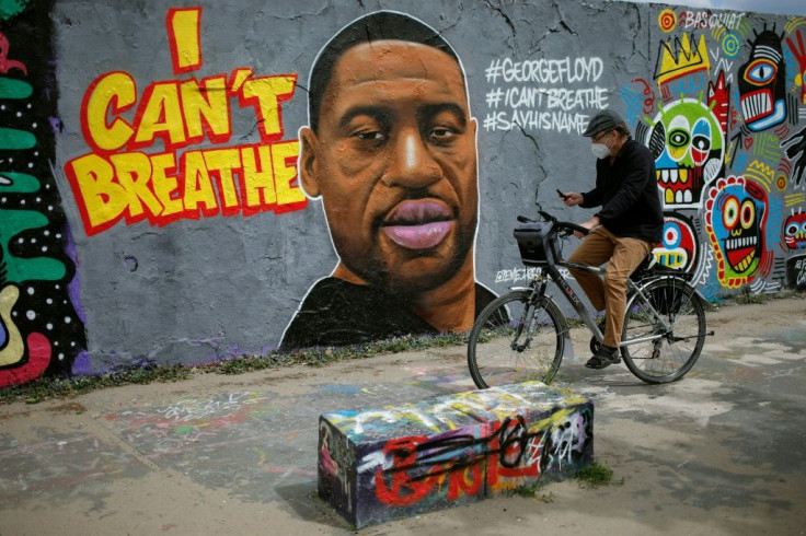 A mural in Berlin honors George Floyd, a black man whose killing in Minneapolis by a white police officer unleashed protests across the United States