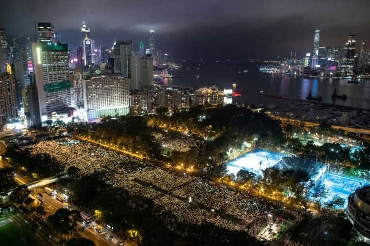 People in 2019 attend a candlelight vigil at Victoria Park in Hong Kong to mark the Tiananmen crackdown anniversary