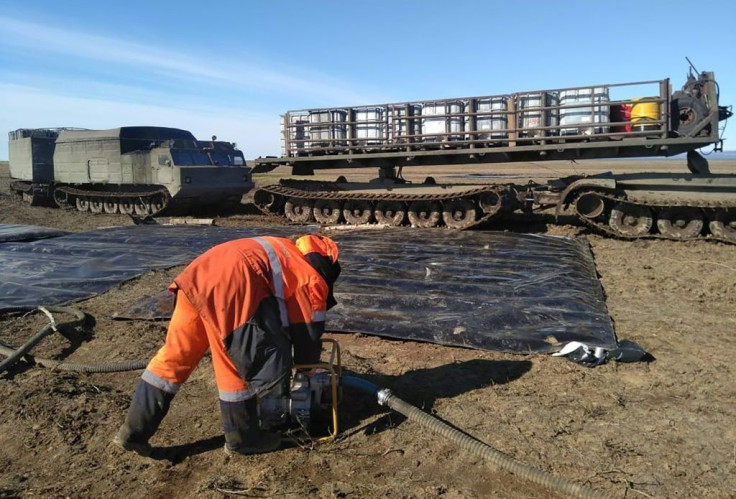 Specialists called in from across Russia managed to stop the spill from spreading further