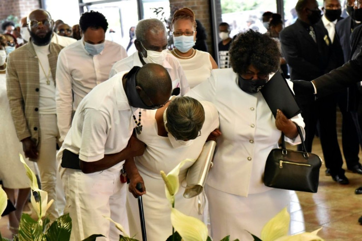 Mourners pay their respects to George Floyd in Raeford, North Carolina, on June 6, 2020