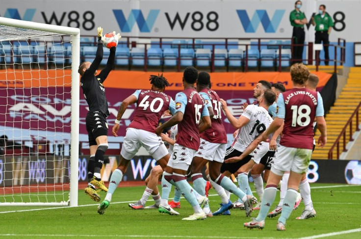 Aston Villa goalkeeper Orjan Nyland appeared to carry the ball over the line but no goal was given