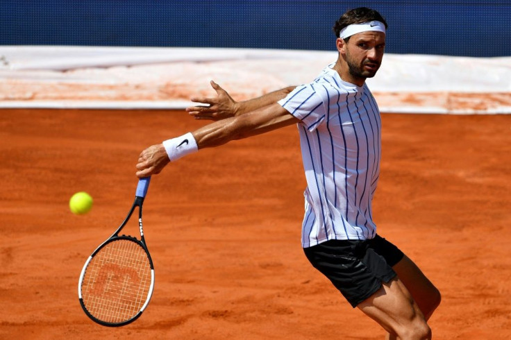 In action: Grigor Dimitrov playing against Serbia's Dusan Lajovic in Belgrade last week