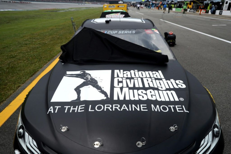 The #11 Drive for Change Toyota, driven by Denny Hamlin -- featuring the logo of the National Civil Rights Museum -- waits on the grid prior to the NASCAR Cup Series race at Talladega that was postponed for a day by thunderstorms