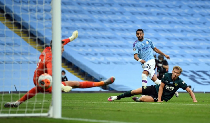 Riyah Mahrez (centre) scores his first goal in Manchester City's thrashing of Burnley