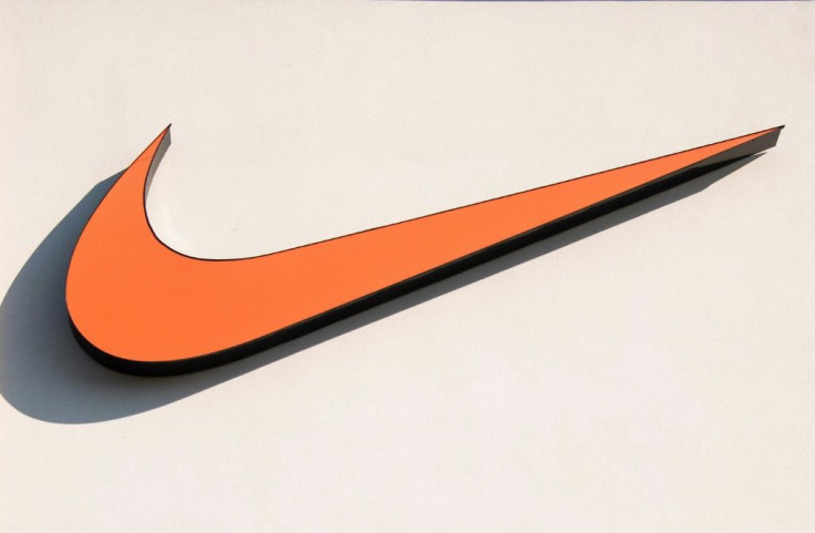 Nike shares fell after it reported a surprise loss following big sales declines in most major markets due to COVID-19 shutdowns