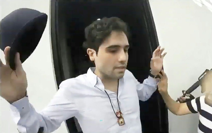 A screenshot of a handout video released by the Mexican Government's Production Centre for Informative and Special Programmes shows the arrest of alleged trafficker Ovidio Guzman, son of jailed drug kingpin Joaquin "Chapo" Guzman, on October 17, 2019
