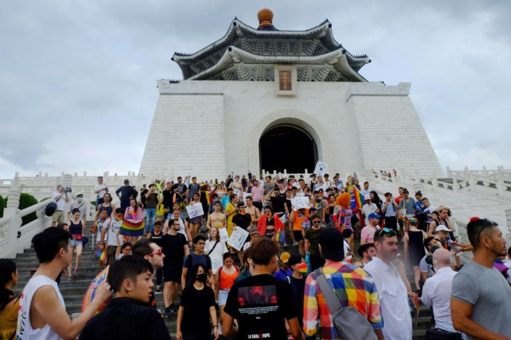 Many of those attending held placards with the names of major global cities that have been unable to celebrate Pride Month this June because of the coronavirus