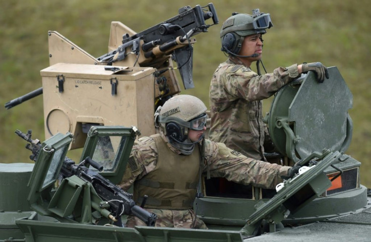 The move will cut the current US troop level in Germany from about 34,500 to 25,000, President Donald Trump's stated goal (US troops pictured near Grafenwoehr, Germany in 2017)