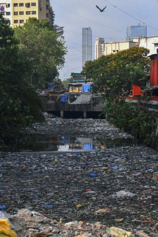 many of Dharavi's estimated one million people scrape a living as factory workers or maids and chauffeurs to Mumbai's well-heeled residents