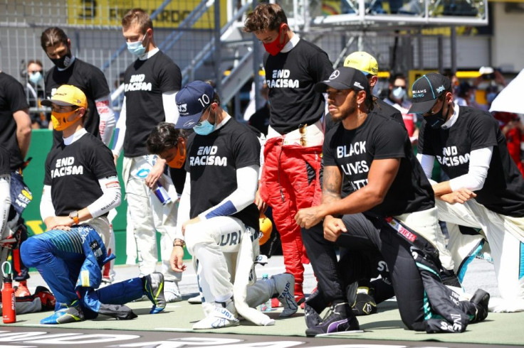 Protest: Lewis Hamilton takes a knee
