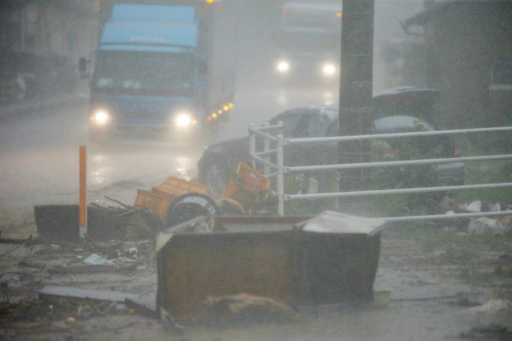 Dozens are feared dead in the floods and landslides that have hit parts of Japan
