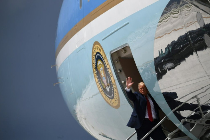 President Donald Trump waves from Air Force One in Miami on July 10, 2020
