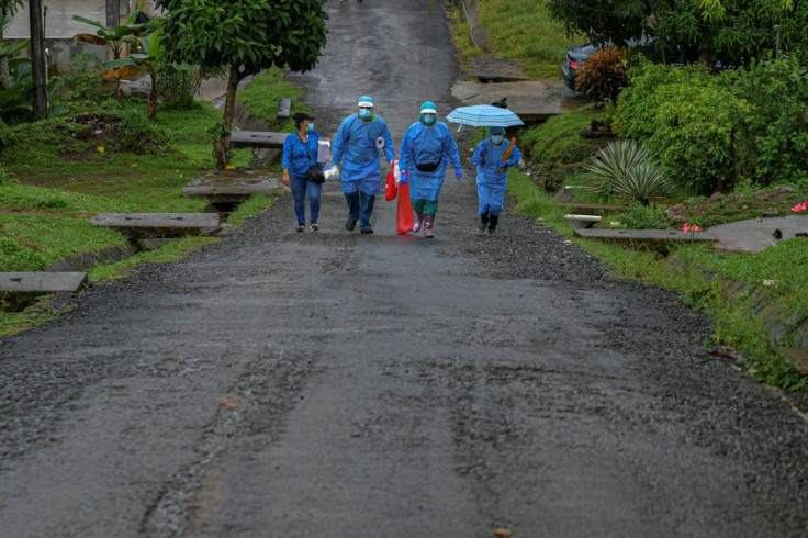 Health care workers face difficulties keeping the coronavirus outbreak under control as many people that know they are infected don't observe containment measures