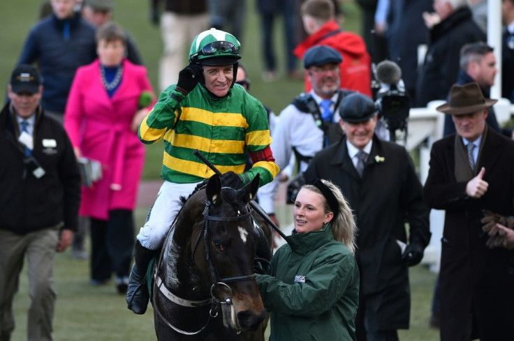 Barry Geraghty, on Saint Roi, celebrates after winning the Randox Health County Handicap Hurdle Race at the Cheltenham Festival in March this year