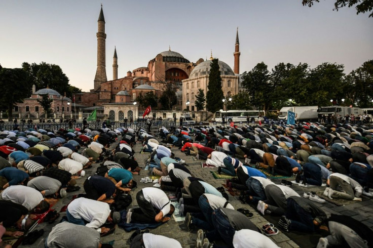 Muslims gathered outside the Hagia Sophia on Friday to celebrate the court decision that cleared the way to converting it back to a mosque