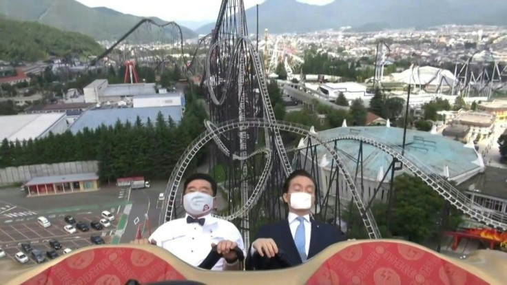 It might be the unlikeliest instructional video ever, but footage of two Japanese amusement park executives demonstrating how to "scream inside your heart" to avoid spreading COVID-19 while on a rollercoaster has been a roaring success