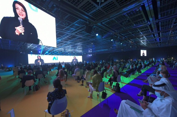 The image of Reem Al-Hashimi, UAE Minister of State for International Cooperation, is projected on large screens as she speaks at the first post-lockdown "real life" conference in the Gulf city of Dubai