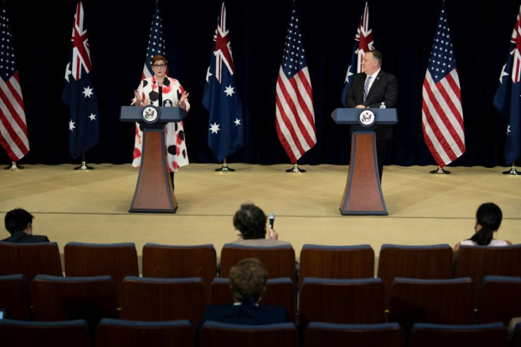 US Secretary of State Mike Pompeo listens while Australia's Foreign Minister Marise Payne speaks during a press conference