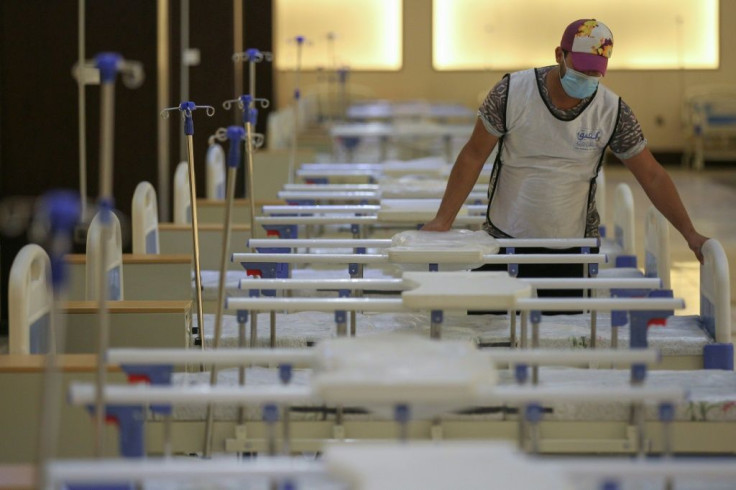 An Iraqi volunteer works on building a 525-bed field hospital at a Baghdad exhibition centre in June to help fight the coronavirus outbreak