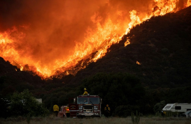 The so-called Apple Fire has charred more than 20,000 acres (8,000 hectares) near San Bernardino, California