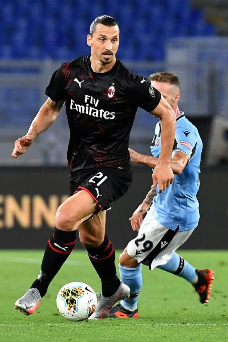 AC Milan forward Zlatan Ibrahimovic (L) became the oldest player aged 38 to score 10 goals in the Italian top flight.