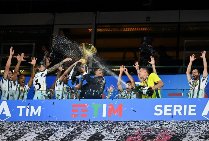 Juventus coach Maurizio Sarri lifts his first Serie A title as Juventus coach.