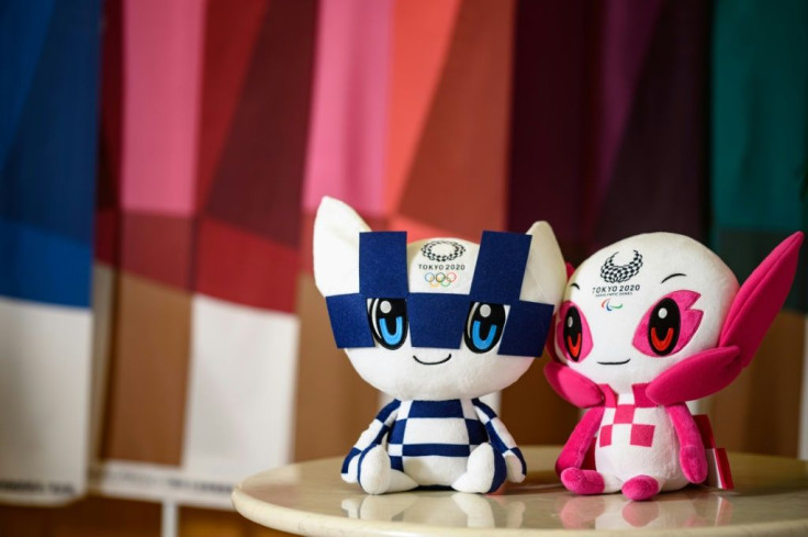 Someity (right), the official mascot of the Tokyo 2020 Paralympics, with Miraitowa the mascot of the Tokyo Olympic Games