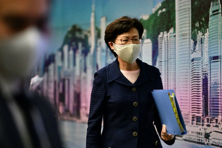 The United States has imposed sanctions on Hong Kong Chief Executive Carrie Lam, seen here leaving a news conference on July 31, 2020