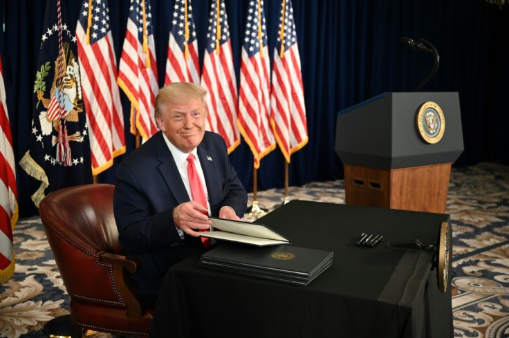 US President Donald Trump signed executive orders extending coronavirus economic relief, during a news conference in Bedminster, New Jersey, on August 8, 2020