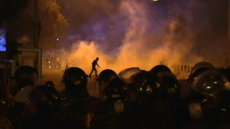 TO COMPLETE VIDI1WE3CK_EN + VIDI1WE33G_EN + VIDI1WE3PW_ENNÂ°1WE41PLebanese police empty martyrs' square with tear gas as angry protesters try to break into the parliament headquarters.