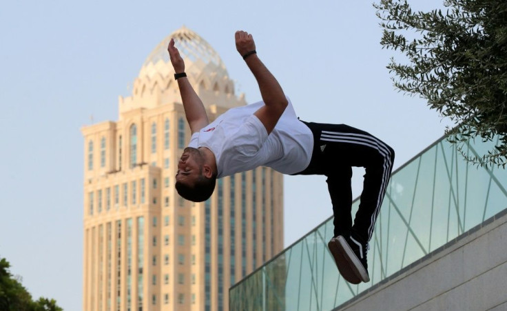 Achref Bejaoui, 25, practices parkour in Doha