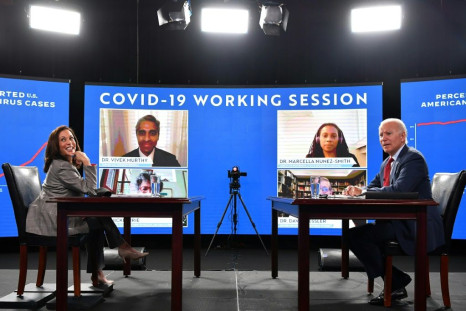 Democratic presidential nominee, Joe Biden (R), and vice presidential running mate, Kamala Harris, receive a briefing on COVID-19 from health experts in Wilmington, Delaware